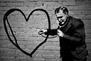 improve form conversion: Banksy street art of doctor with stethoscope to heart